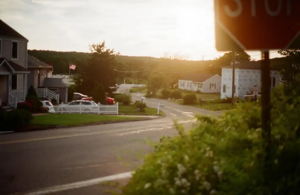Sunlight along a residential street.